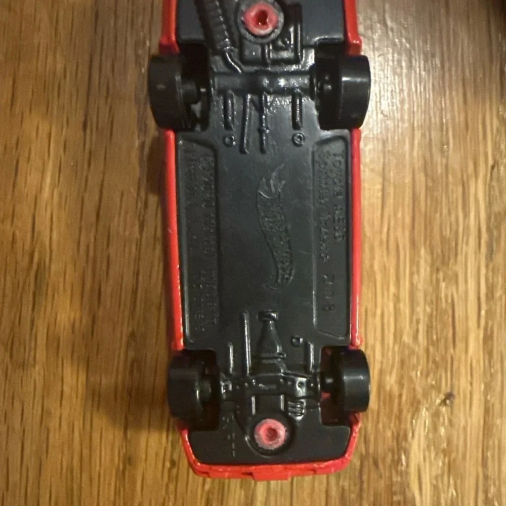 Speedy Red Toy Car with Gold Accents
